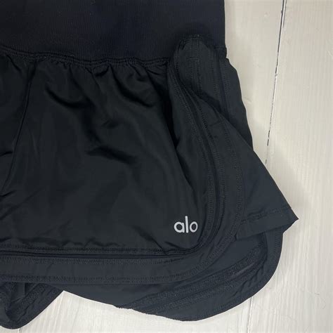 Alo yoga black shorts size xs based on my... - Depop