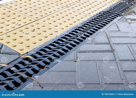 Rain Grate On The Sidewalk In The Rain Stock Image Image Of Rain