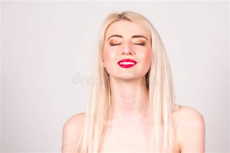 Blonde Woman With Closed Eyes Make Up And Smile With Teeth Beauty