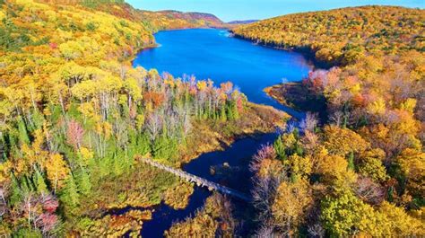 Premium Photo Aerial Autumn Splendor Over Serene Lake And Bridge