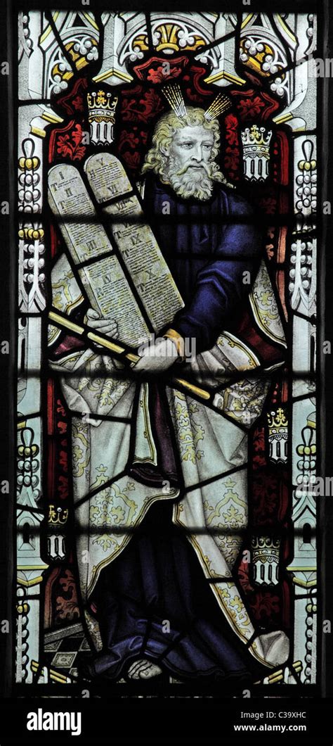 A Stained Glass Window By C E Kempe Co Depicting Moses Holding The