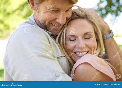 Smile Love And Couple Hug Outdoor For Care Connection And Bonding