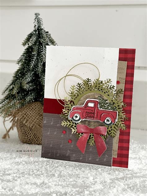 A Christmas Card With A Red Truck On It And A Pine Tree In The Background