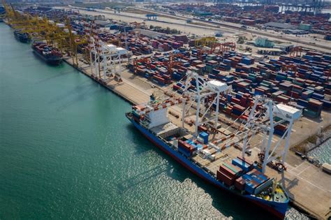 Premium Photo Container Ship Terminal And Quay Crane Of Container