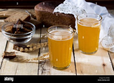 Traditional Russian Cold Rye Drink Kvas In A Glass And A Jug On A