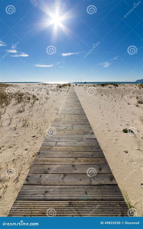 Wooden Walkway Leading To The Beach Over Sand Dunes Stock Photo Image