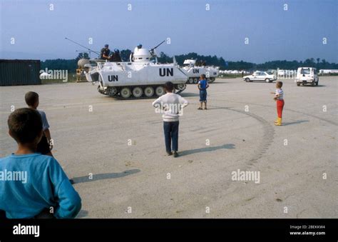 1995 Tuzla, Bosnia - UN tank protecting the UN Tuzla airfield temporary refugee camp for Bosnian ...