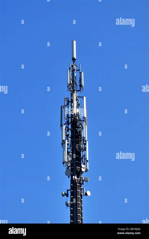 Telecom Tower Antennas And Satellite Transmits The Signals Of Cellular