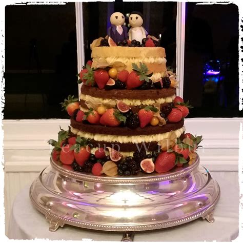 Three Tiers Naked Wedding Cake With Fresh Fruits Top Tier Lemon Sponge Cake With Lemon Curd