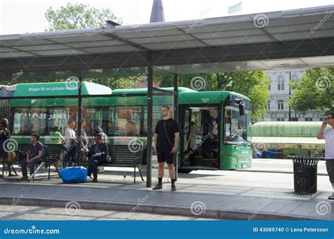 Crowd Of People At A Bus Stop Editorial Image Image 43089740