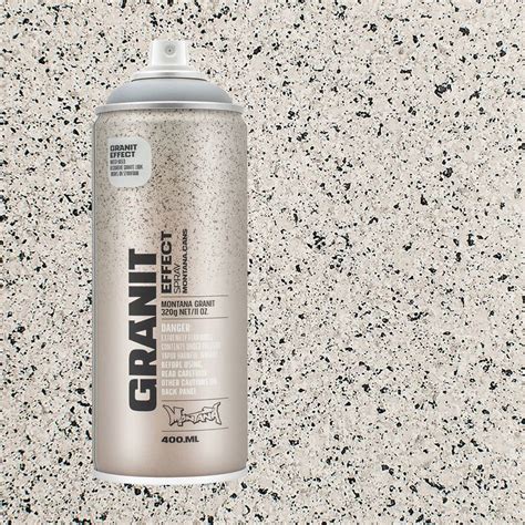 A Can Of Gray Spray Paint Sitting On Top Of A White Countertop With