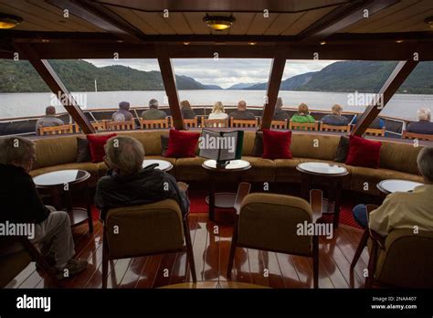 A ship cruises along Loch Ness in Scotland Stock Photo - Alamy