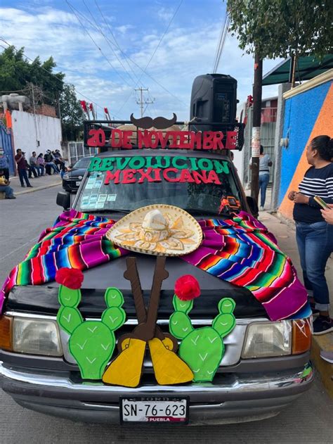 A Car With Mexican Decorations On The Hood