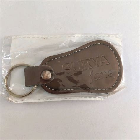 Oval Brown And Silver Key Holder Pu Leather Keychain Packaging Type