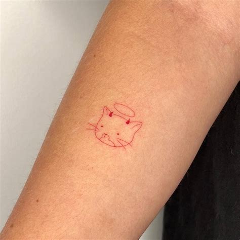 Fine Line Style Devil Cat Tattoo Located On The Inner