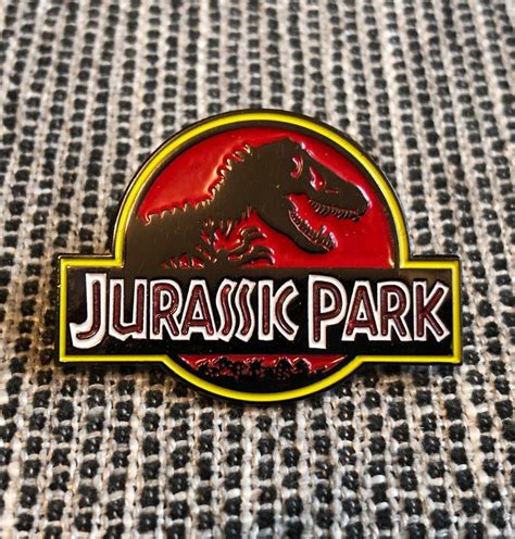 Jurassic Park Inspired Enamel Pin Badge Classic Movie Logo Etsy Enamel Pins Enamel Pin