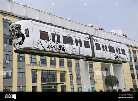 An Elevated New Energy Monorail Train Travels Along A Km Air Rail At