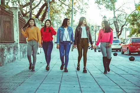 Premium Photo Group Of Women Walking On The Street