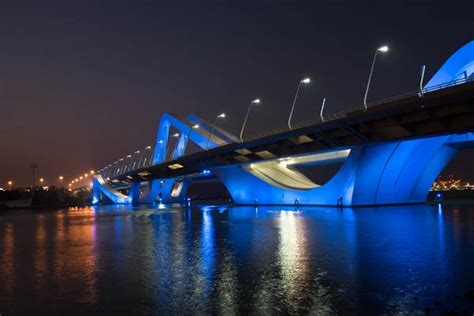 Sheikh Zayed Bridge at night Stock Photo by ©dvoevnore 102699784