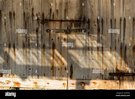 Weathered Wooden Door With Rusty Metal Bolt On Sunny Day In Sa Caleta