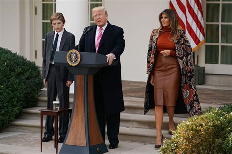 Barron Trump, 15, looks all grown up as he leaves Trump Tower with mom ...