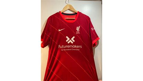 A Pair Of Limited Edition Futuremakers Shirts One Signed By Liverpool