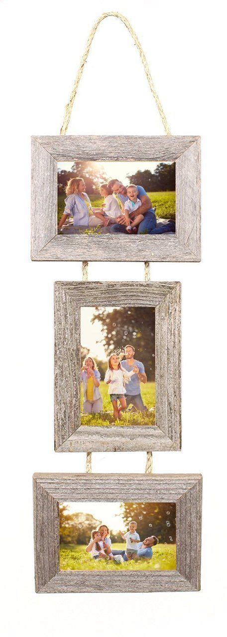 Three Frames Hanging On A Rope With Two Pictures In Them And One Is