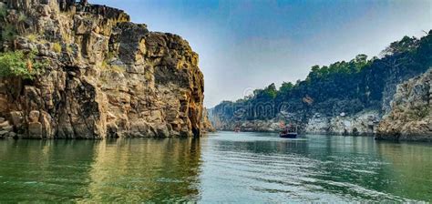 The Tranquil Narmada Flows Through High Marble Rocks In Bhedaghat