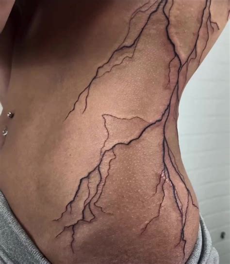 The Ink Lab Lightning Tattoo Done By Artist Hand Tattoos Retro Tattoos Discreet Tattoos