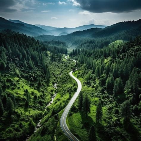 Premium Photo Aerial Top View Mountaint Road In Dark Green Forest