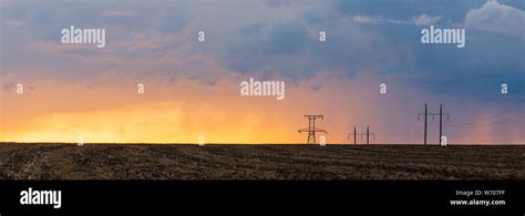 Epic Sunset With Rural Landscape With High Voltage Line Stock Photo Alamy