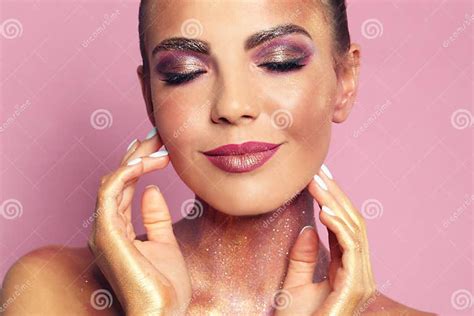 Young Woman With Glitter Makeup On Pink Stock Image Image Of Glow