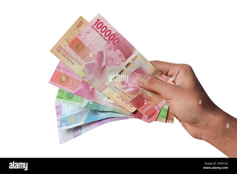 A Man S Hand Shows Rupiah Money Isolated On A White Background Rupiah