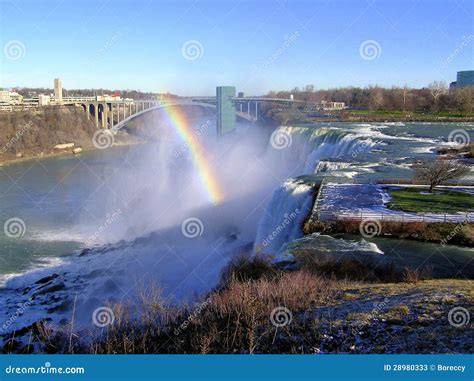 Rainbow Over Niagara Falls And Rainbow Bridge Stock Image Image Of