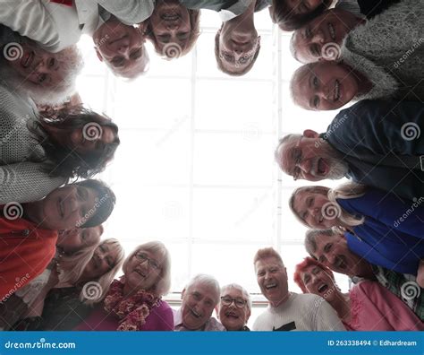 Happy People Looking Down At Camera Stock Photo Image Of Team