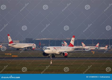 Austrian Airlines Plane Taxiing On Runway In Vienna Airport Vie