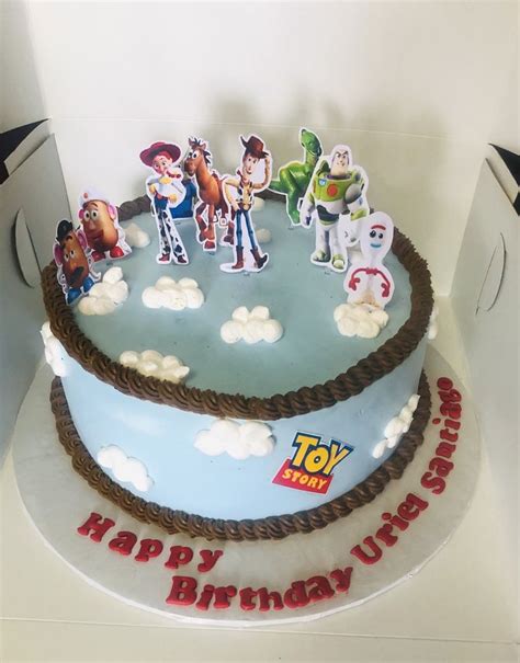 A Birthday Cake With Toy Story Characters On It