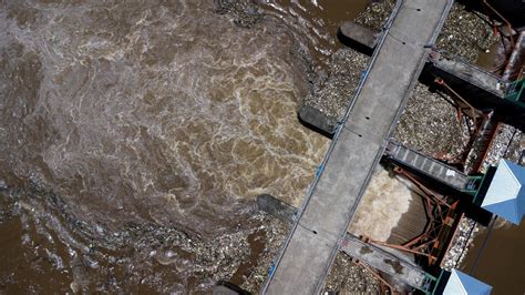 Aerial View Of The Water Released From The Concrete Dam S Drainage