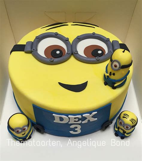 A Birthday Cake Decorated To Look Like A Minion