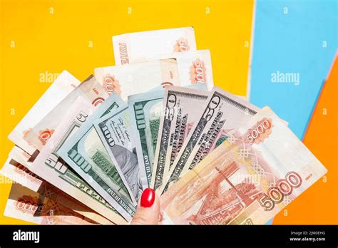 Russian Rubles On Background Of Us Dollars Concept Of Exchange Rate
