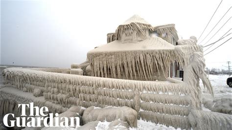 Extreme winter snow storm in US leaves buildings covered in icicles - YouTube