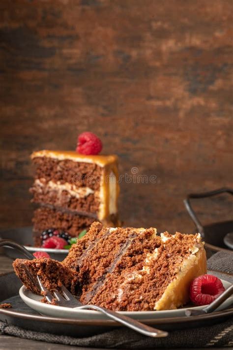 Delicious Semi Naked Chocolate Cake With Caramel Topping And Decorated With Blackberries And