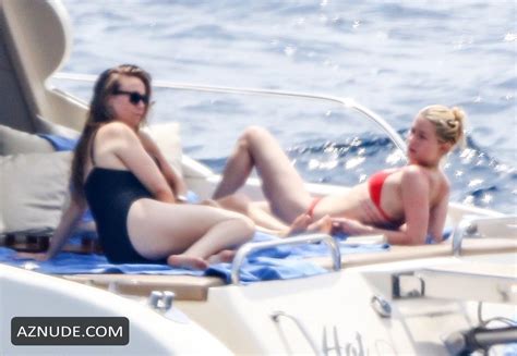 Amber Heard Enjoys A Day In A Red Bikini With Friends Aboard A Yacht On The Amalfi Coast Aznude