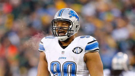 Suh blames numb feet on Rodgers leg stomp - Sports Illustrated