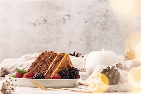 Delicious Semi Naked Chocolate Cake With Caramel Topping And Decorated With Blackberries And