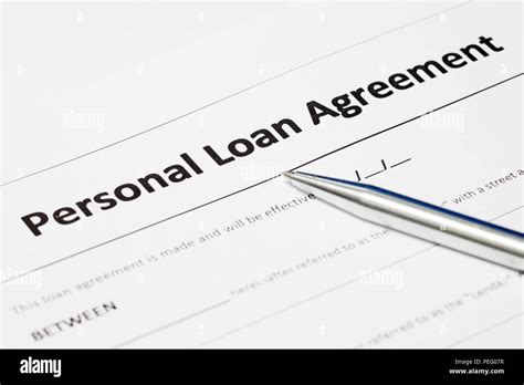 Personal Loan Agreement Form Document And Stainless Steel Pen Stock