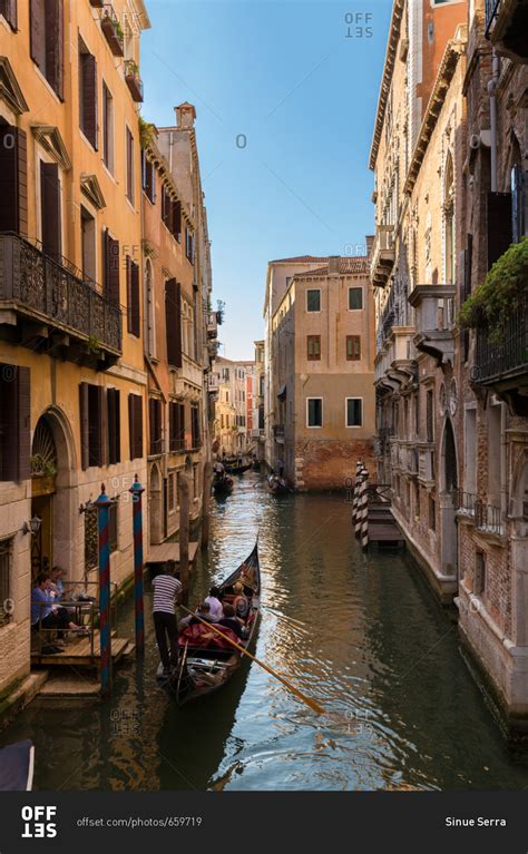 June 20, 2015: Gondolas and Classical Buildings in the Canals of Venice ...