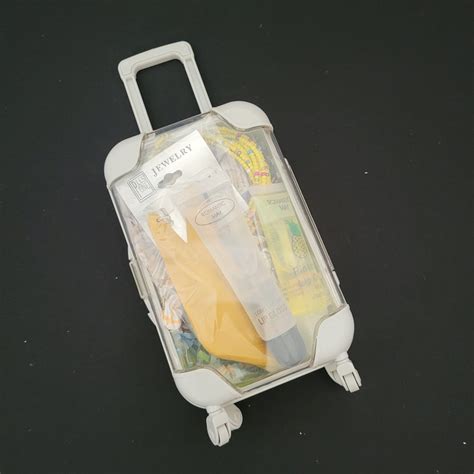 Rolling Suitcase with Accessories/Lip Gloss/Earring/Scrunchie and More ...