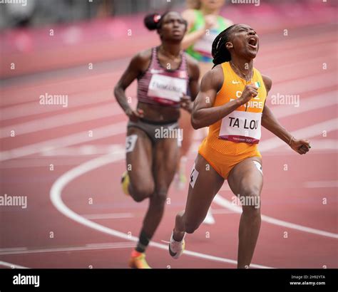 Marie-Josée Ta Lou competing in the 100 meters of the Tokyo 2020 ...