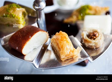 Turkish Dessert Platter With Toast On Steel Tray In Restaurant Stock